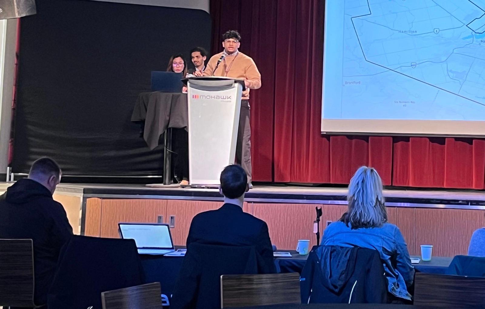 Delivering presentation at HEAD Competition - Hamilton